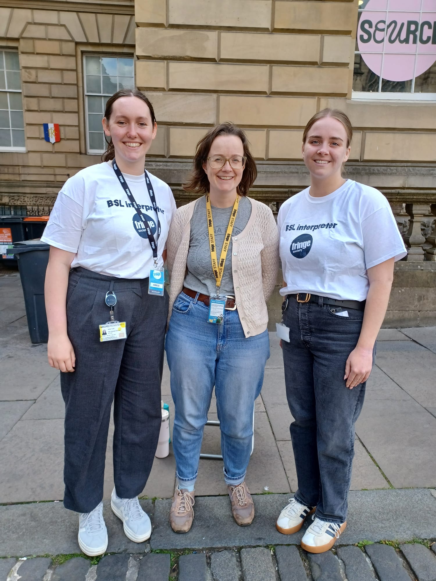 Lyndsey McClean Access and Engagement Manager at Edinburgh Fringe with BSL interpreters each side