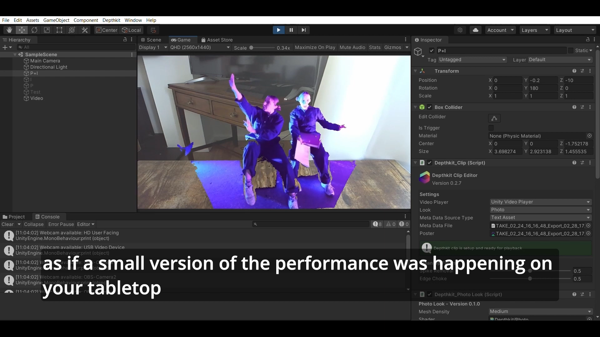 Screenshot from editing software displaying footage of a table onto which augmented reality versions of two performer are projected