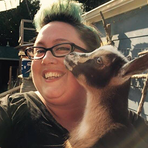 Stacy Bias headshot with goat