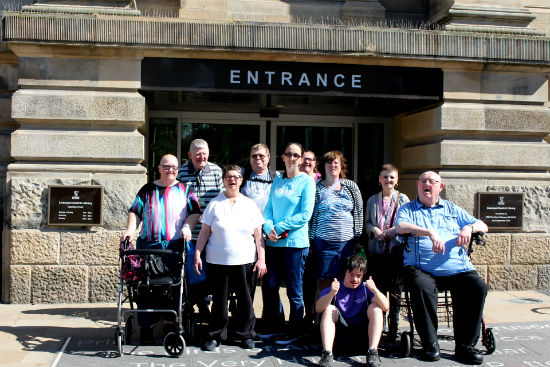 A photo of a group of men and women from The Advocacy Project