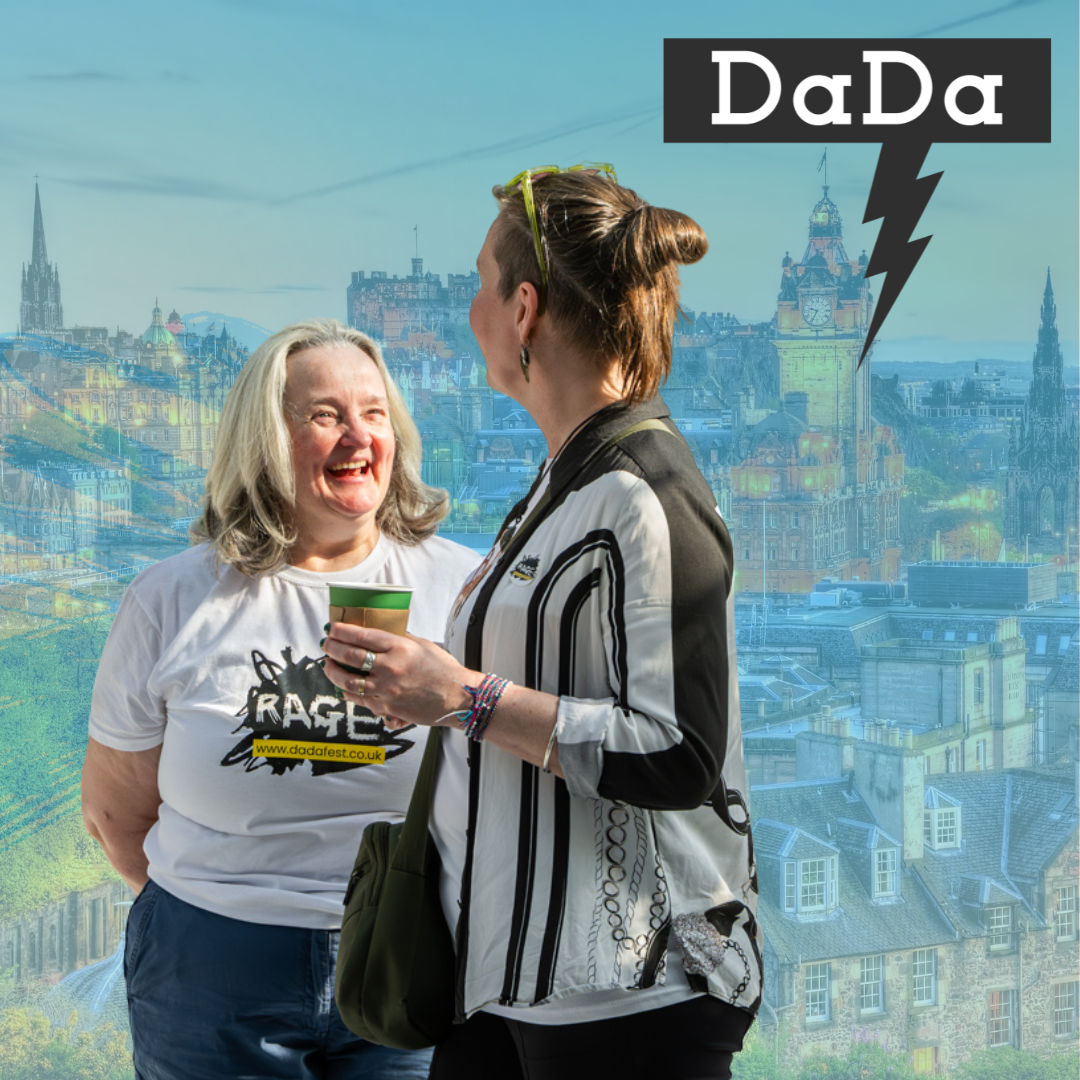 Denise and Rachel from DaDa are looking at each other and smiling. Behind them colourised in blue is an Edinburgh skyline